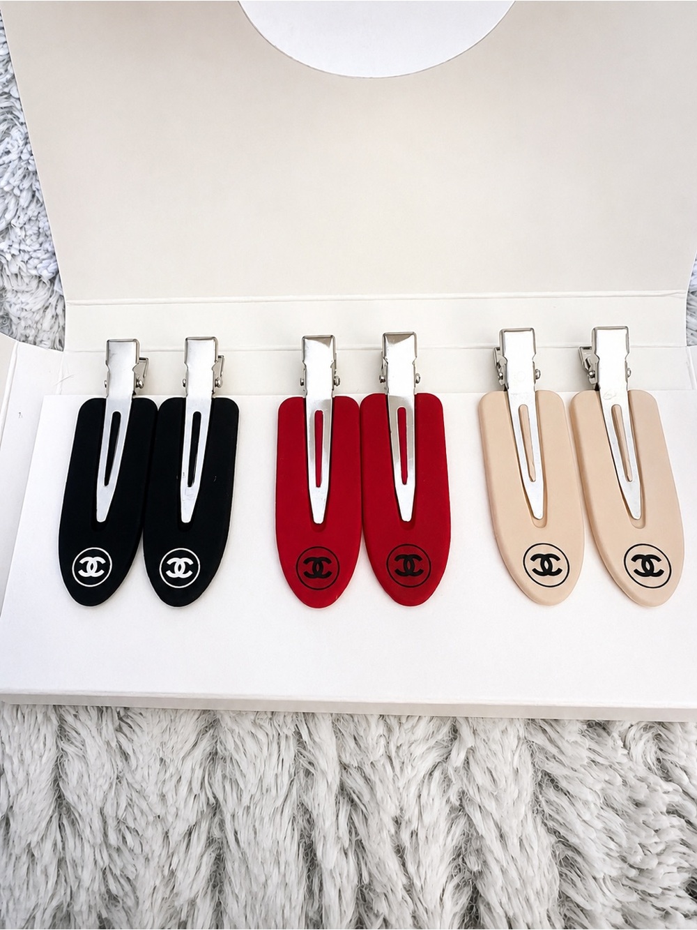 CHANEL Triple-Pair Logo Hair Clips in Black, Red, Beige